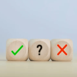 three wooden dice : ok, maybe, no