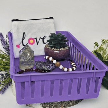 a purple basket with a purple basket with a aventurine crystal plant in it
