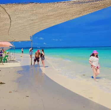 Nakupenda sandbank in Zanzibar, Tanzania – tourists enjoying the tropical paradise and crystal-clear waters