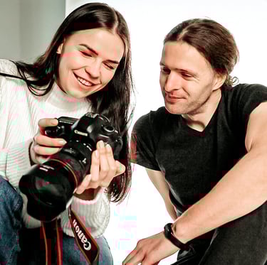 Photographer engaging with a client in a professional studio setting