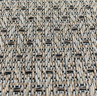 a close up of a woven
