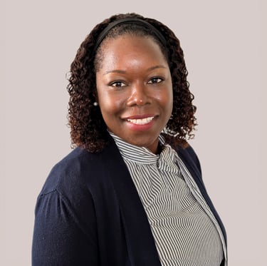 a woman in a black jacket and a white shirt