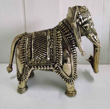"Handcrafted angry baby elephant featuring floral tribal motifs-for foreign trade"