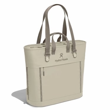 Hydro Flask insulated soft cooler tote bag in tan birch with shoulder straps for picnics and travel.