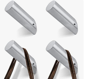 a set of four metal hooks with a rope