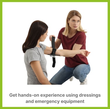 learning being shown how to use dressings and emergency equipment