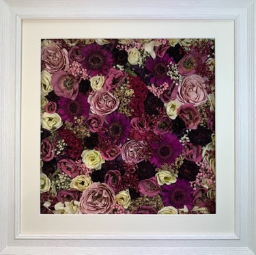 a bold magenta flower wall style preserved wedding bouquet in a frame
