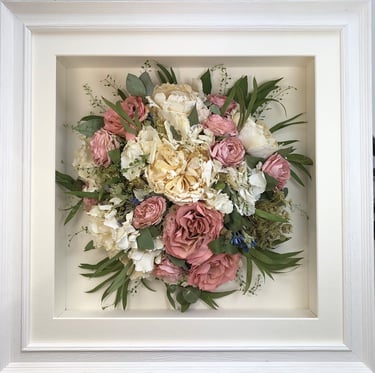 Soft spring coloured Birdseye view preserved wedding bouquet in a frame