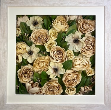 a flower wall style preserved wedding bouquet with white flowers in a frame