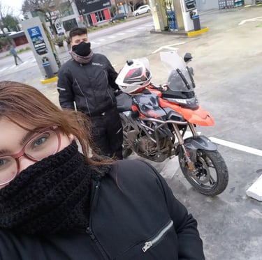 a woman in a black jacket and a man in a black jacket and a black