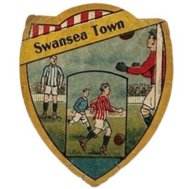Vintage Swansea Town football crest featuring players in action on a shield-shaped badge.