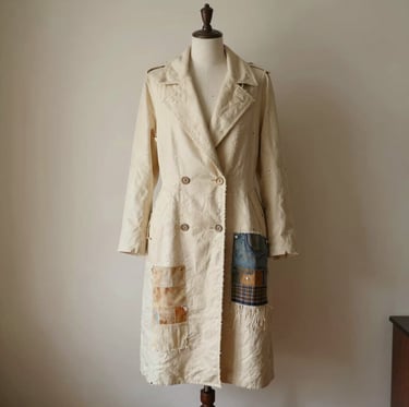 Elegant designer handbags displayed on a vintage wooden table