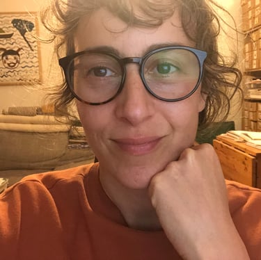 me wearing my glasses and looking into the camera