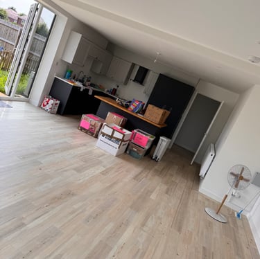 boxes stacked in a corner by deanos removals