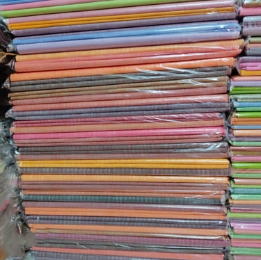 Colorful Mulberry Silk Fabric Bundles from India β Premium Silk for Weaving and Export