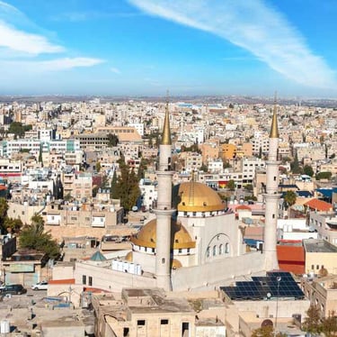 Aerial shot of Madaba city and King Hussein Mosque