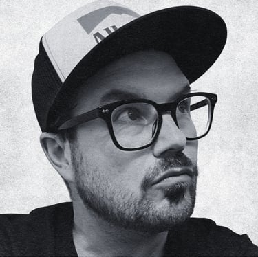 Here he is. Jordan Scott. Calgary Writer, Director, Producer. Circa 2026. He's looking up here. 
