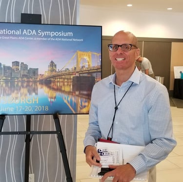 Photo of david D'Arcangelo about to present at the national ADA Symposium