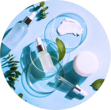 a table with a lot of cosmetics products on it