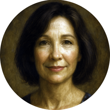 A warm, wise woman with kind eyes and a calm, knowing gaze