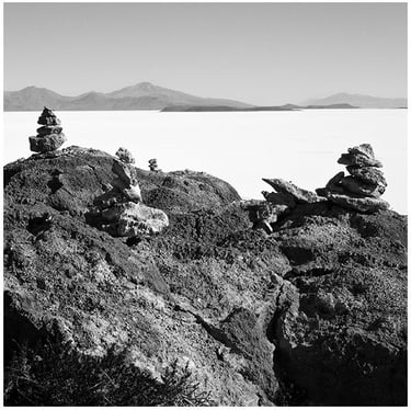 Bolivia: a black and white photo of a rock formation
