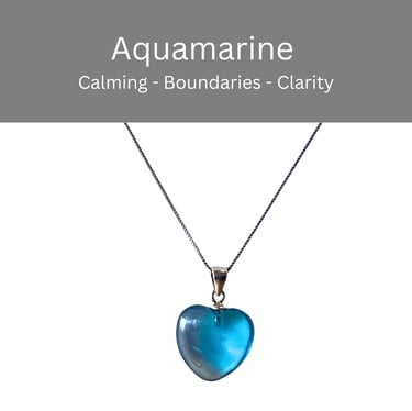 A heart-shaped blue aquamarine crystal pendant necklace for calming energy and clarity.