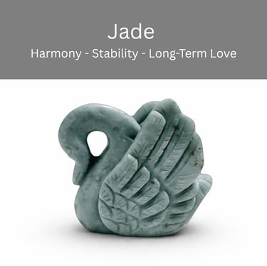 A hand-carved green jade swan figurine representing harmony, stability, and love.