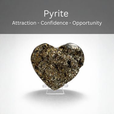 Sparkling metallic pyrite crystal heart on a display stand for manifestation and confidence.
