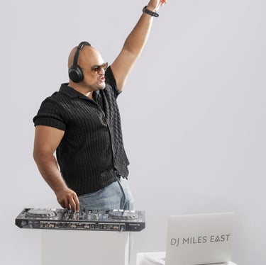 a dj playing music on a dj set