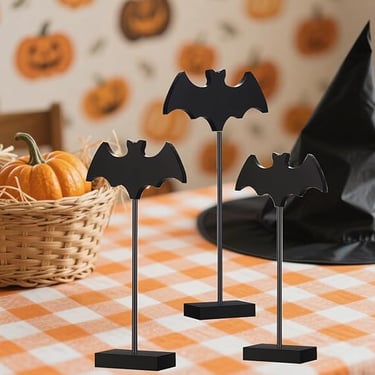 Three black wooden bat figurines on stakes with bases, Gothic Halloween tabletop decoration