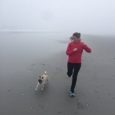 enjoying the beach with beloved pet