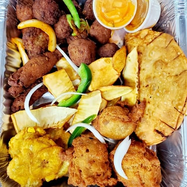 a tray of food with a variety of food items