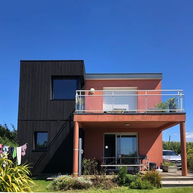 Extension ossature bois, bardage noir en Finistère