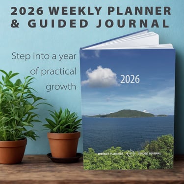2026 Weekly Planner and Guided Journal A5 Hardcover on shelf next to two potted plants