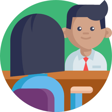 a man in a suit and tie is sitting at a desk