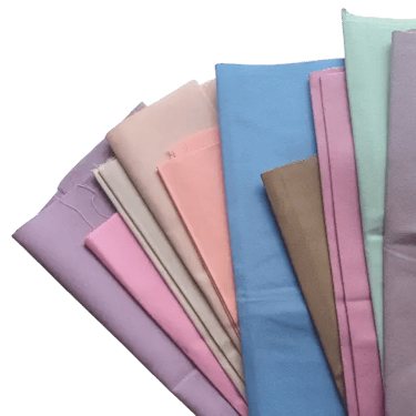 Tumpukan kain kanvas polyester SIGNIFO berbagai warna.