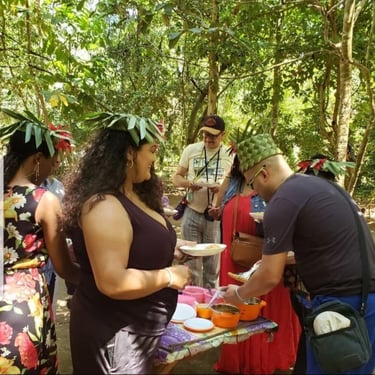 Visitor picking the food they cooked during a Zanzibar spice tour cooking class at a spice farm, guided by an expert local