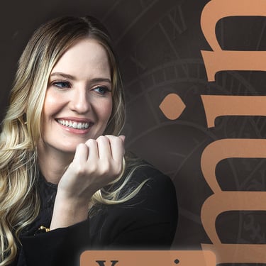 a woman with blonde hair and a black top yasmin belini