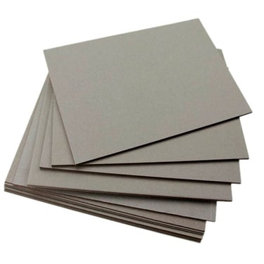 a stack of flat paper boards