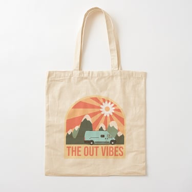 a tote bag with a van and mountains in the background