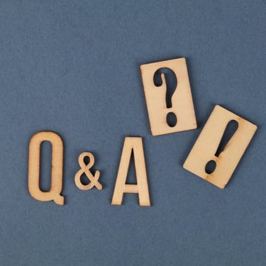 Q&A block pieces on blue background that show Gold IRA Q&A