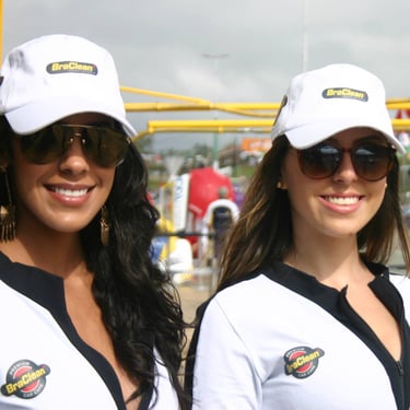 two women in white shirts and black sunglasses