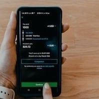 person holding black samsung android smartphone