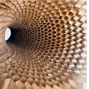 a honeycombed paper sculpture of a honeycombed flower