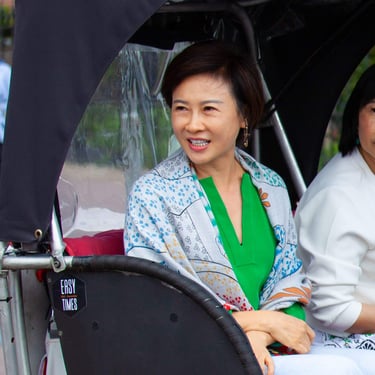 chinese woman on bike taxi