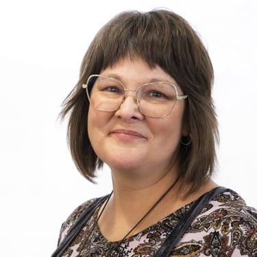 Headshot of Sheridan Garman-Neeman