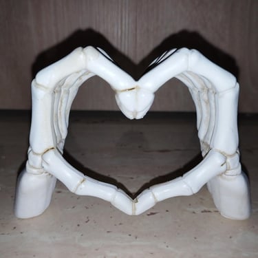 Resin skeleton hands forming a heart shape, Gothic Halloween decoration and romantic figurine