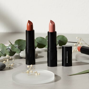 a variety of lipsticks on a table