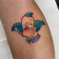 a tattoo of a cartoon character from the simpsons