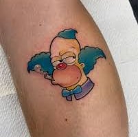 a tattoo of a cartoon character from the simpsons